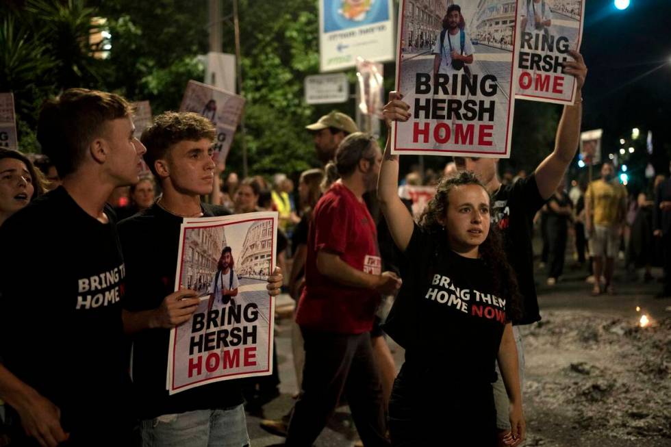Supporters of Israeli-American hostage Hersh Goldberg-Polin, who was kidnapped on Oct. 7, 2023, ...