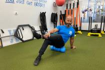 The author demonstrates myofascial release. Using a foam roller, this self-massage technique ca ...