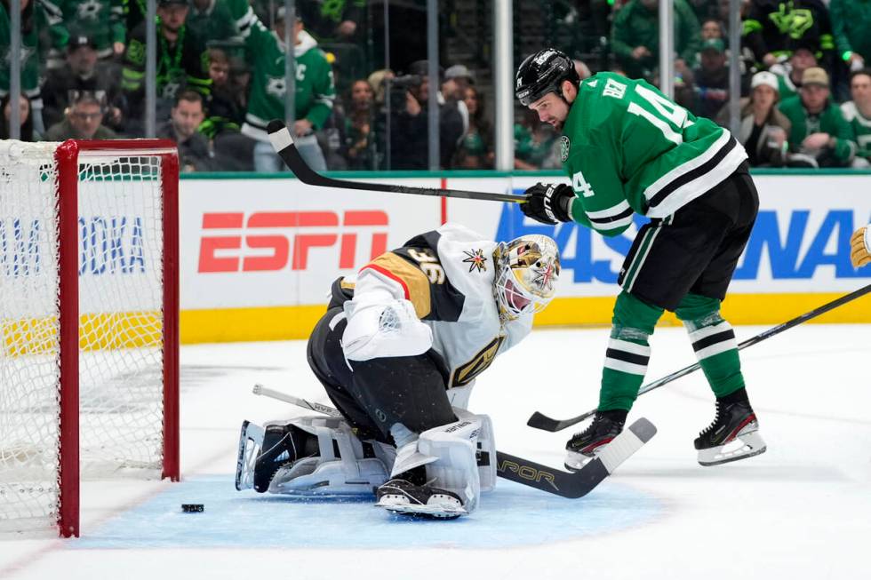 Dallas Stars left wing Jamie Benn (14) scores against Vegas Golden Knights goaltender Logan Tho ...