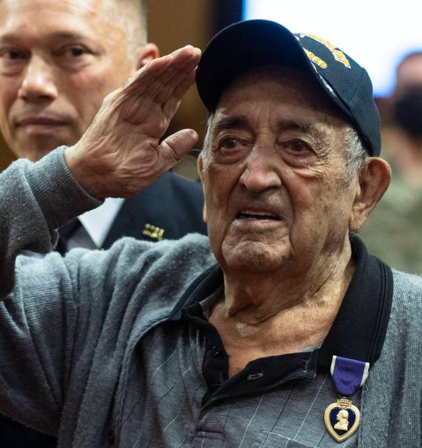 World War II veteran Onofrio "No-No" Zicari salutes after receiving a Purple Heart at Las Vegas ...