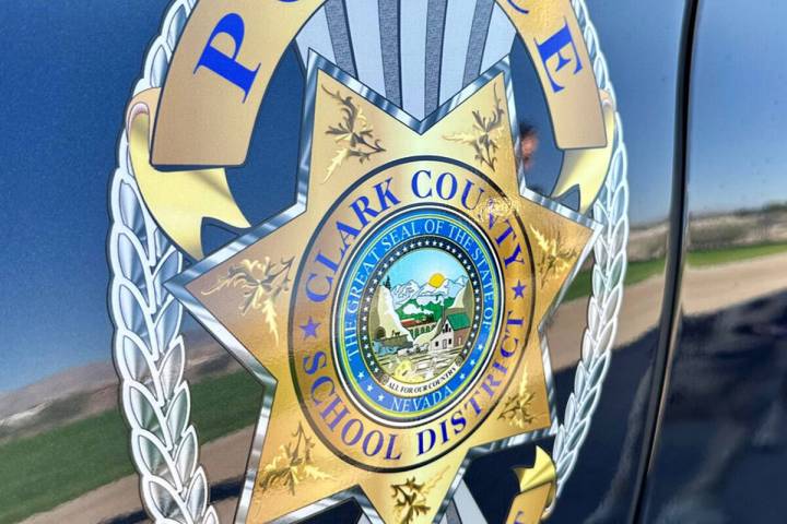 The Clark County School District Police Department insignia is seen on the side of a school pol ...