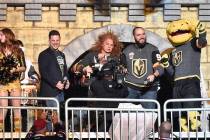 Carrot Top sounds the siren to begin the first period of the game between the Golden Knights an ...