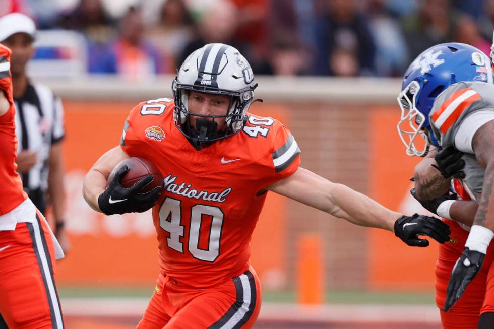 National running back Dylan Laube of New Hampshire (40) carries the ball during the second half ...