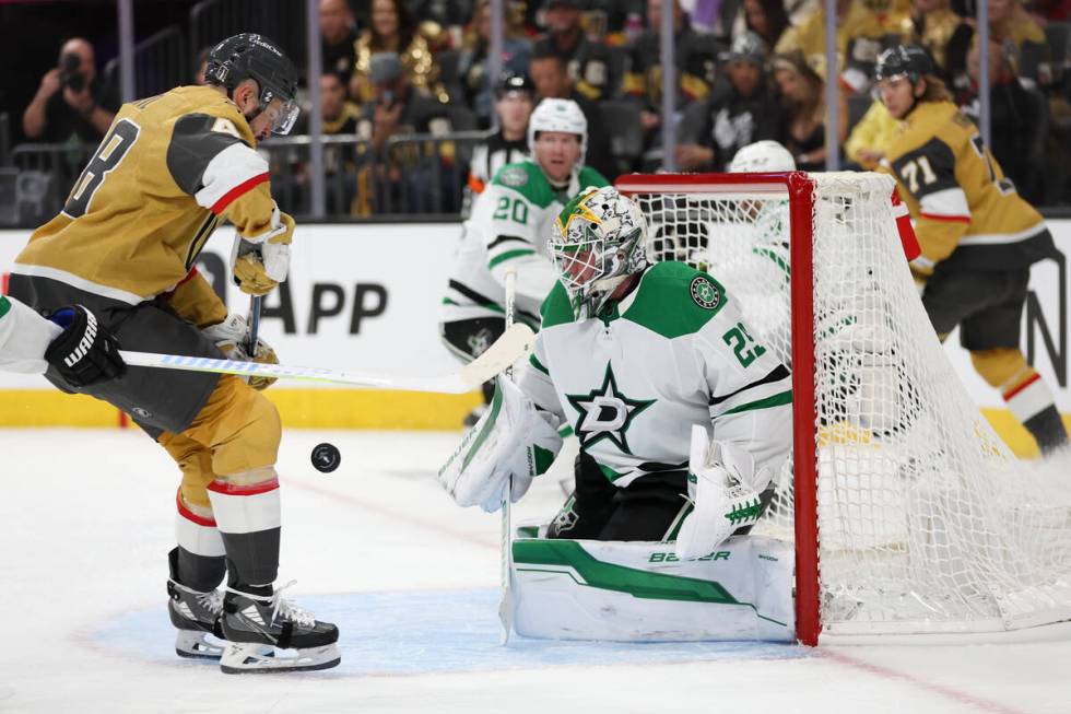 Golden Knights center Tomas Hertl (48) attempts a goal on Stars goaltender Jake Oettinger (29) ...