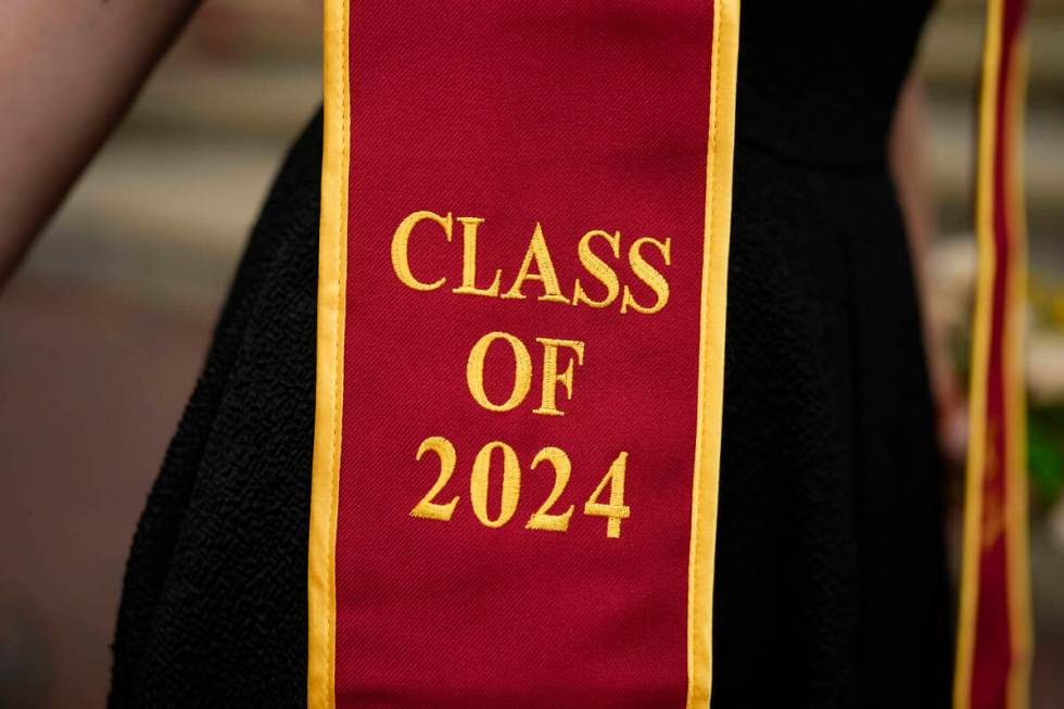 A recent graduate wears a garment with their graduation year on the University of Southern Cali ...