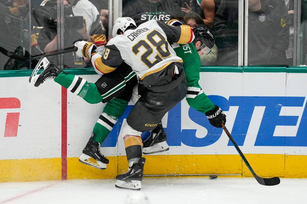 Vegas Golden Knights left wing William Carrier (28) and Dallas Stars defenseman Nils Lundkvist ...