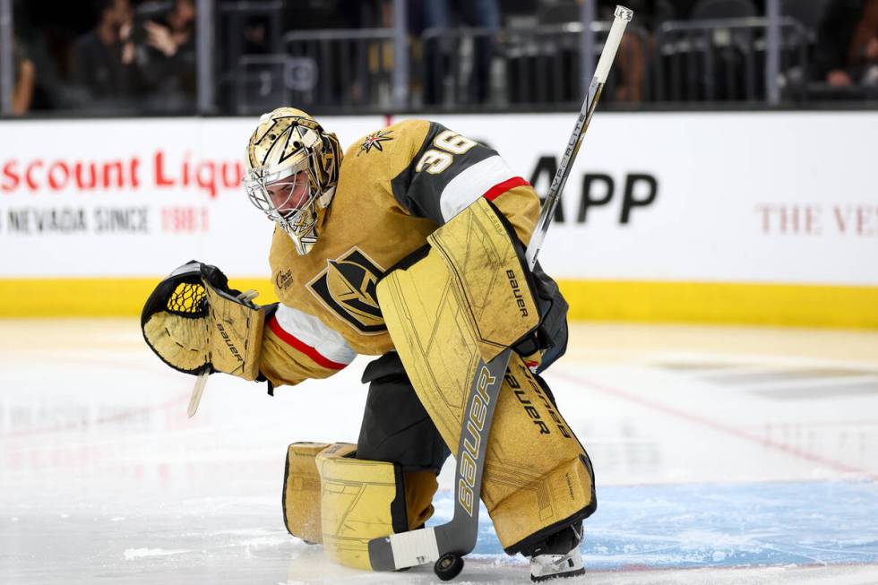 Golden Knights goaltender Logan Thompson (36) saves the puck during the second period in Game 3 ...