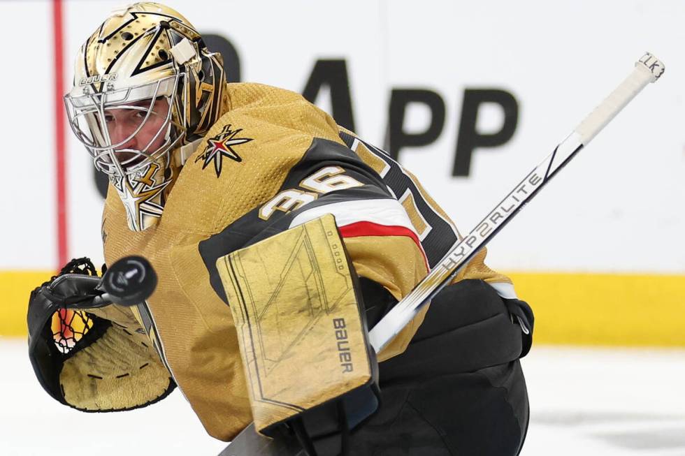 Golden Knights goaltender Logan Thompson (36) makes a save during the second period in Game 3 o ...