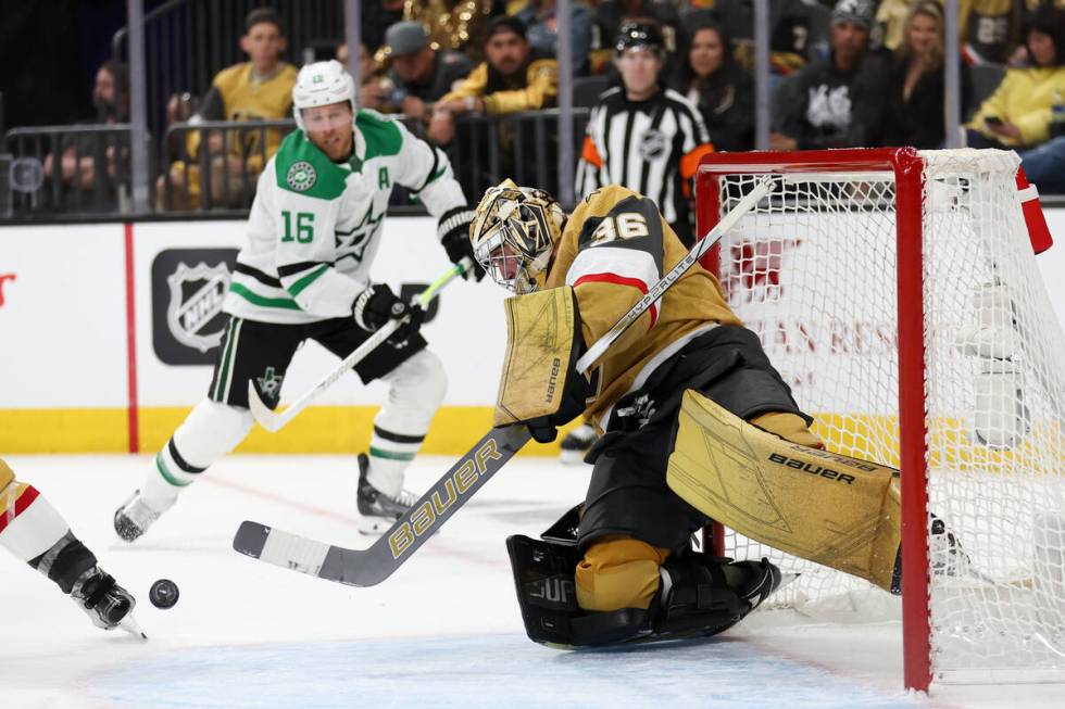 Golden Knights goaltender Logan Thompson (36) saves a shot on goal by Stars center Joe Pavelski ...