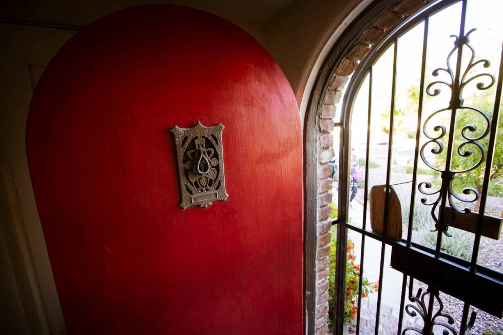 The original peephole is pictured in a 1939 Tudor home in the historic John S. Park neighborhoo ...