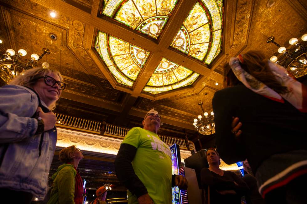 Richard Hooker, former Urban Arts Coordinator for the City of Las Vegas, center, leads a tour p ...