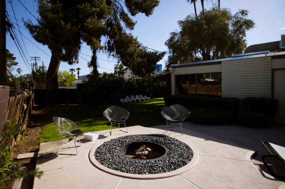 A fire pit near the pool is seen at a 1964 home in the historic John S. Park neighborhood durin ...