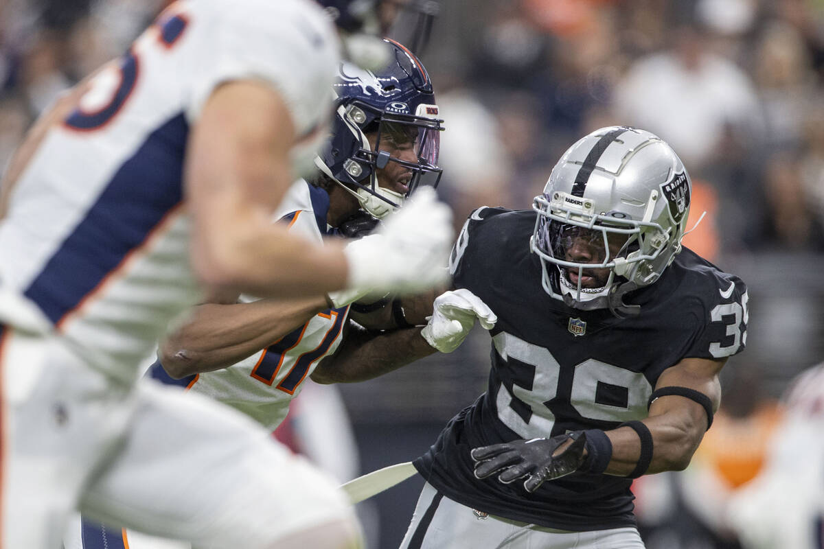 Raiders cornerback Nate Hobbs (39) defends against Denver Broncos wide receiver Lil'Jordan Hump ...