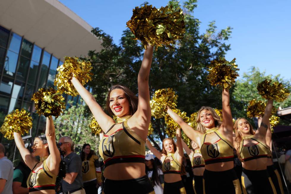 The Vegas Viva cheerleaders parade toward T-Mobile Arena before Game 4 of an NHL hockey Stanley ...