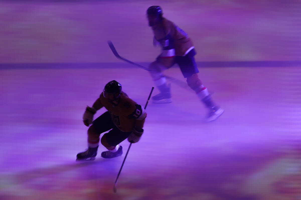 Golden Knights center Nicolas Roy, left, right wing Mark Stone during take the ice for Game 4 o ...