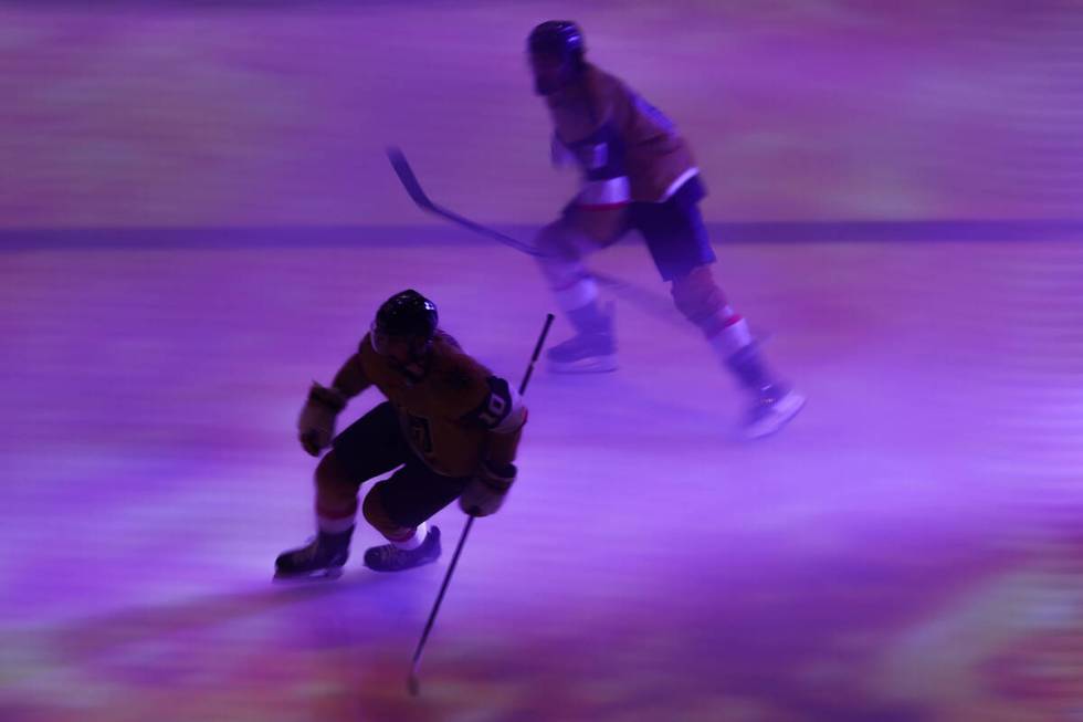 Golden Knights center Nicolas Roy, left, right wing Mark Stone during take the ice for Game 4 o ...