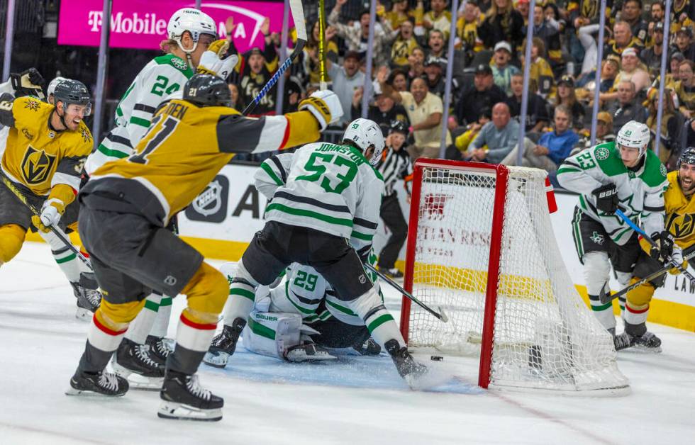 Golden Knights players celebrate a goal by right wing Michael Amadio (22) past Dallas Stars goa ...