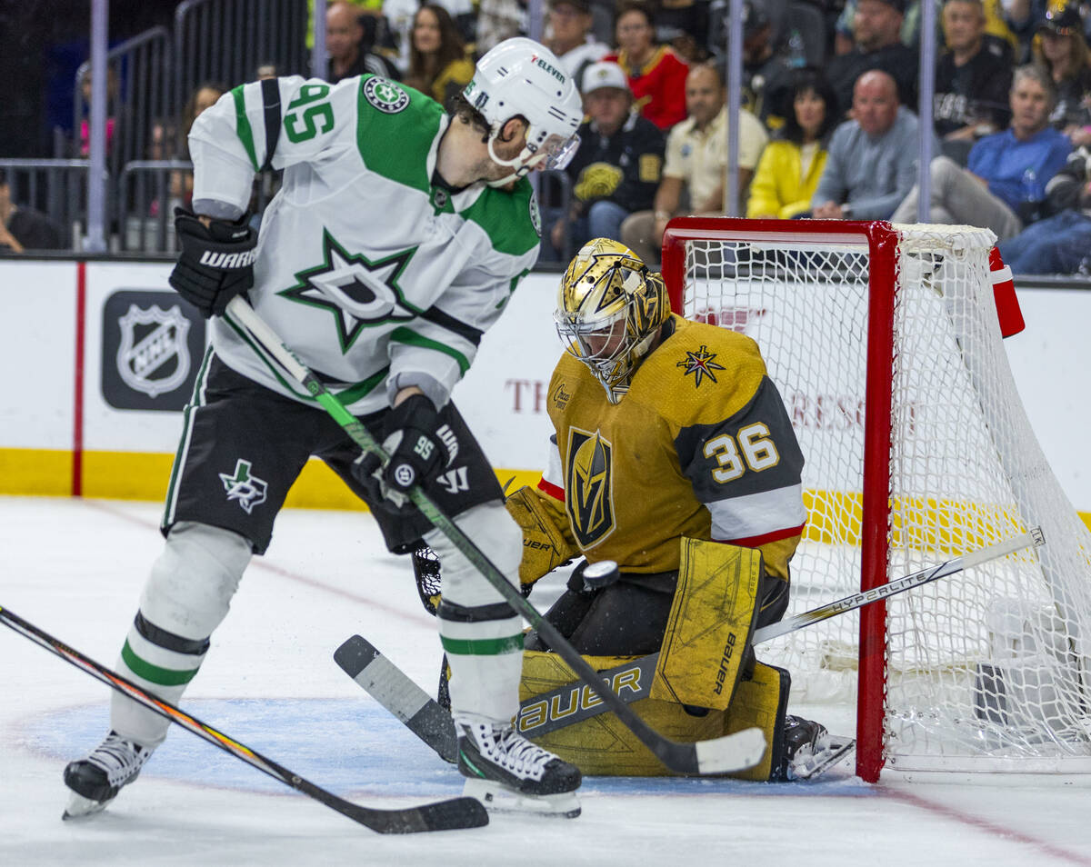 Golden Knights goaltender Logan Thompson (36) stops a shot by Dallas Stars center Matt Duchene ...