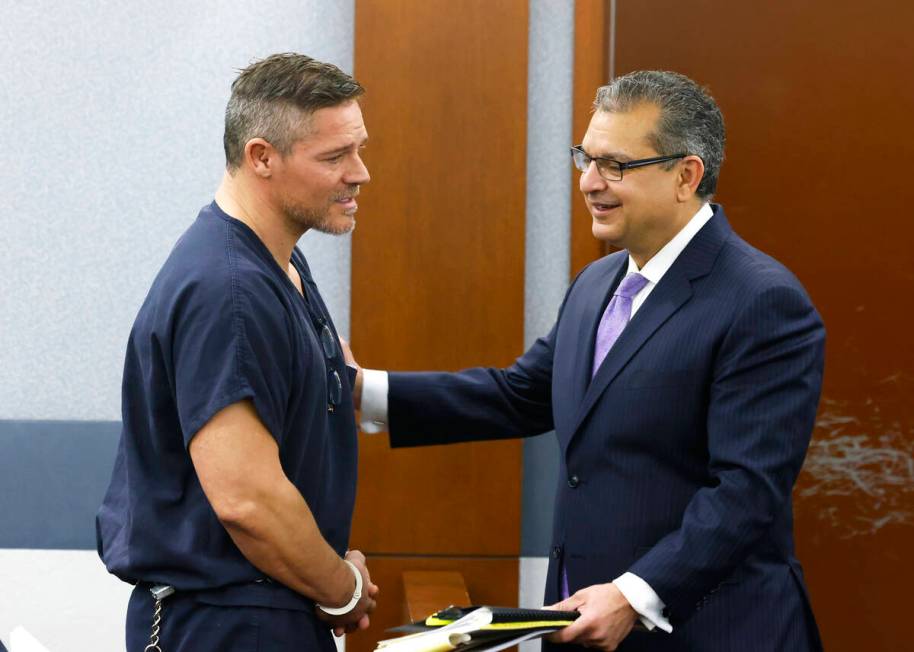 Defense attorney Christopher Oram listens to Jose “Chille” DeCastro, who was sentenced on a ...