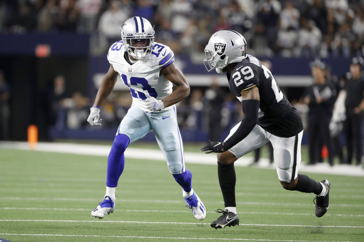 Dallas Cowboys wide receiver Michael Gallup (13) runs a route while Las Vegas Raiders cornerbac ...