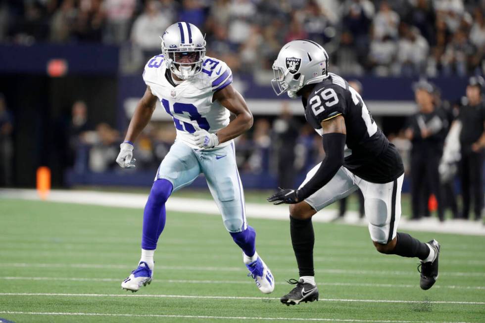 Dallas Cowboys wide receiver Michael Gallup (13) runs a route while Las Vegas Raiders cornerbac ...