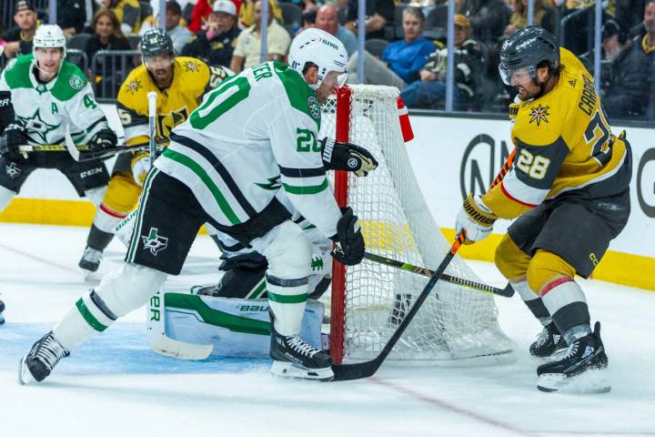 Golden Knights left wing William Carrier (28) attempts to slip a shot past Dallas Stars defense ...