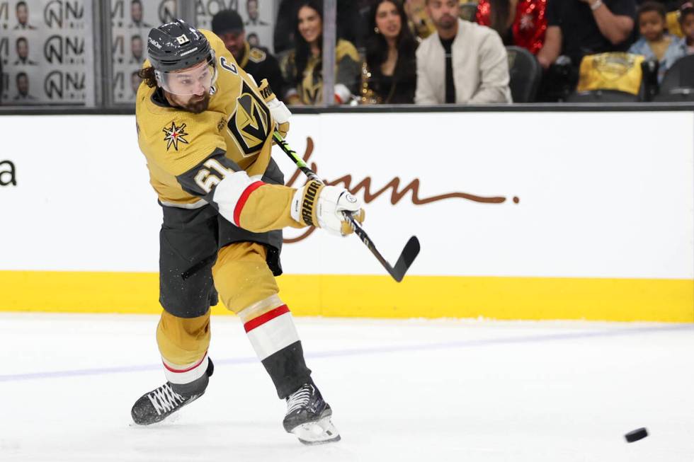 Golden Knights right wing Mark Stone (61) takes a slap shot on the Stars during the first perio ...