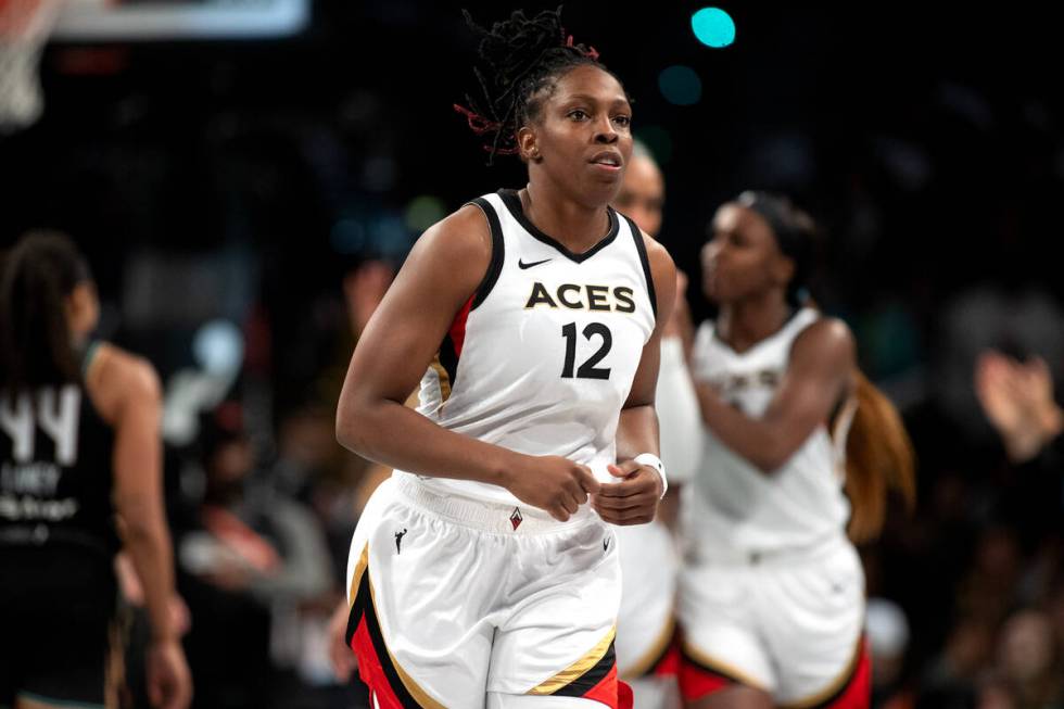 Las Vegas Aces guard Chelsea Gray (12) runs toward the bench during the second half in Game 3 o ...