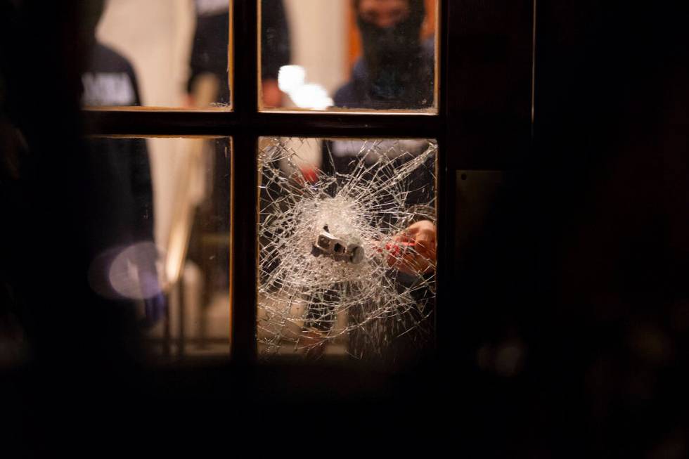 Students with the Gaza Solidarity Encampment break the doors to the entrance of Hamilton Hall a ...