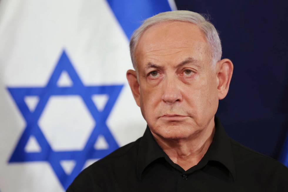 Israeli Prime Minister Benjamin Netanyahu attends a press conference in the Kirya military base ...