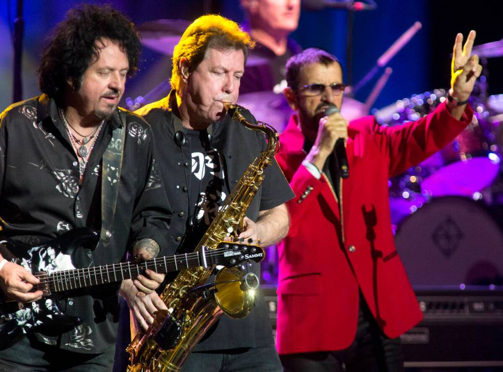 Steve Lukather, left, Warren Ham and Ringo Starr perform in concert with Ringo Starr and His Al ...