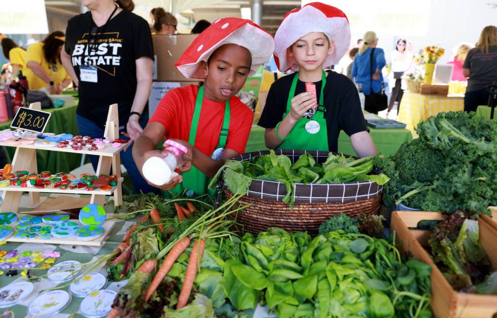 Students from Thiriot Elementary School prepare for customers during the Clark County School Di ...