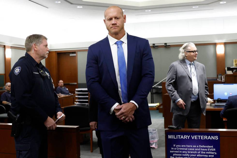 Daniel Rodimer, center, a former congressional candidate and pro wrestler, leaves the courtroom ...