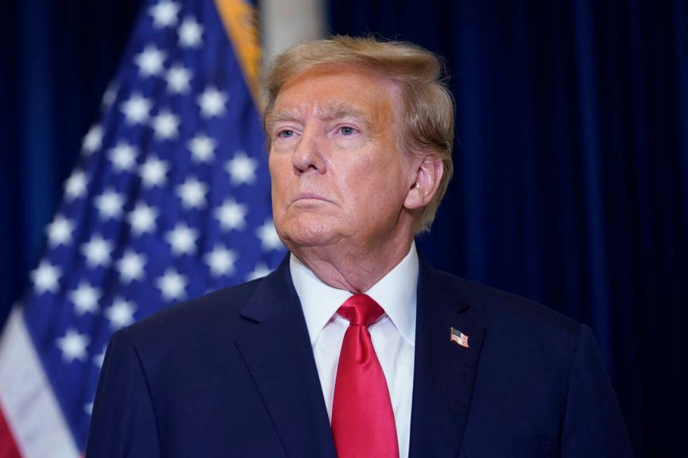 Former President Donald Trump speaks to the media at a Washington hotel, Tuesday, Jan. 9, 2024, ...