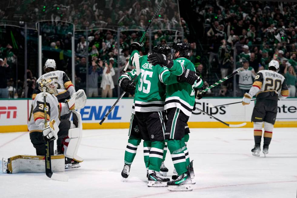 Dallas Stars' Matt Duchene and Tyler Seguin, center right, and others celebrate a goal scored b ...