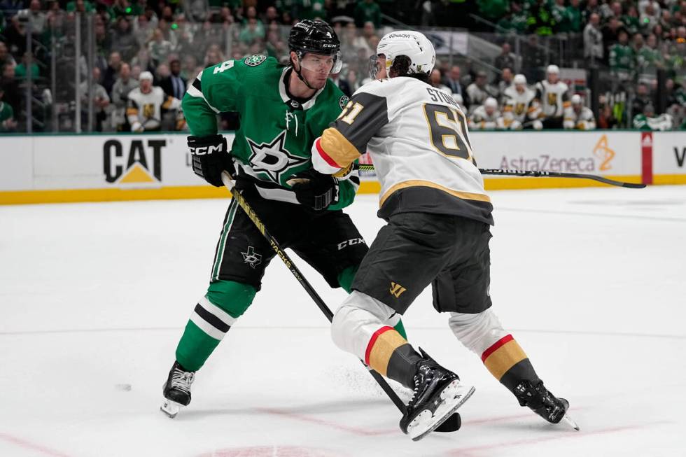 Dallas Stars defenseman Miro Heiskanen (4) keeps Vegas Golden Knights right wing Mark Stone (61 ...