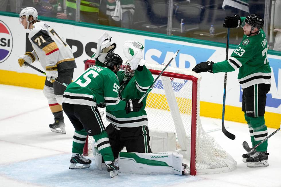 Dallas Stars' Matt Duchene (95), Jake Oettinger (29) and Esa Lindell (23) celebrate the team's ...