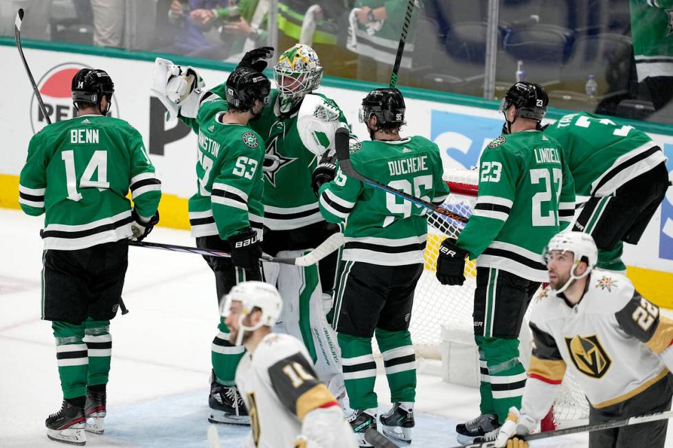 Dallas Stars' Jamie Benn (14), Evgenii Dadonov (63), goaltender Jake Oettinger, Matt Duchene (9 ...