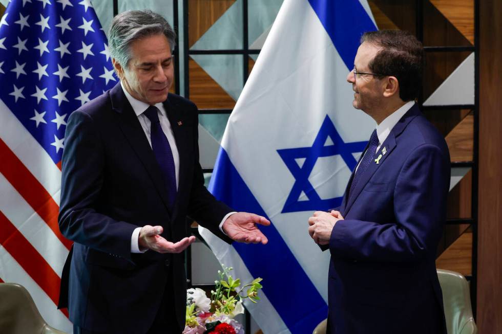 U.S. Secretary of State Antony Blinken, left, meets with Israeli President Isaac Herzog in Tel ...