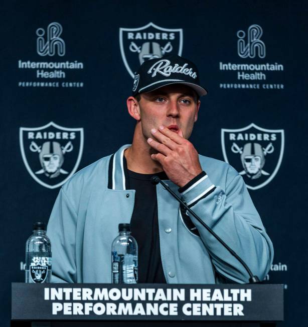 Raiders first round draft pick Brock Bowers considers a question as he speaks during a press co ...