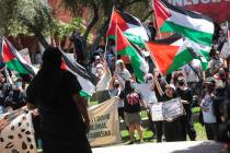 Pro-Palestianian protesters and student groups chant on campus at UNLV on Wednesday, May 1, 202 ...