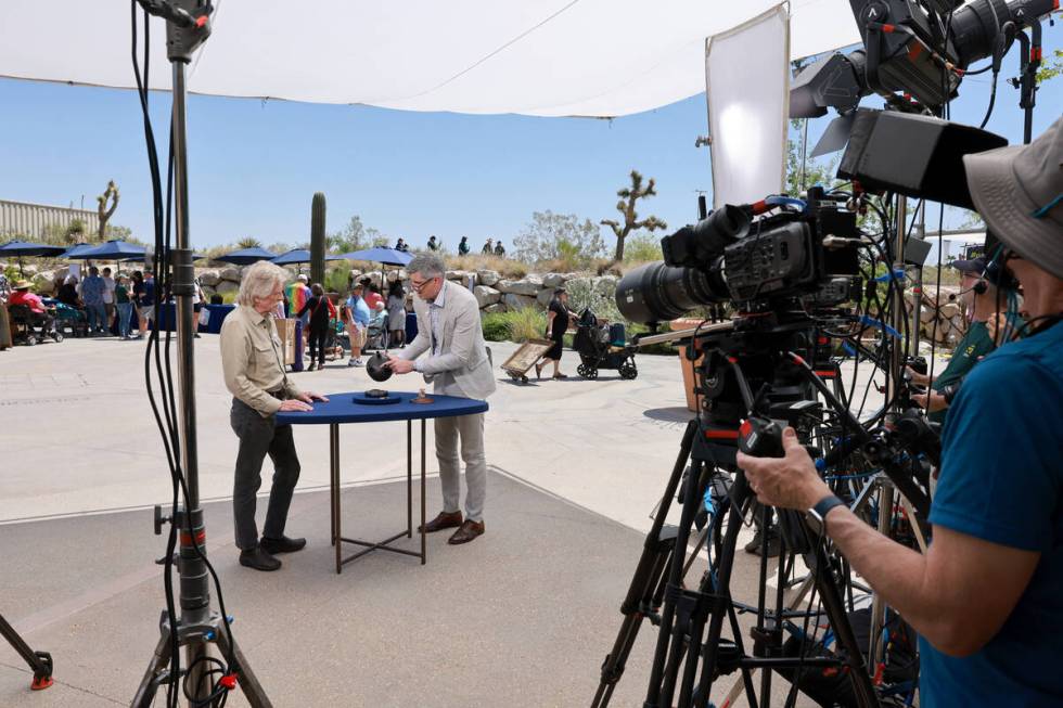 Mark, left, talks to expert Richard Cervantes about his Chinese Archaistic Bronze Ding Vessel d ...