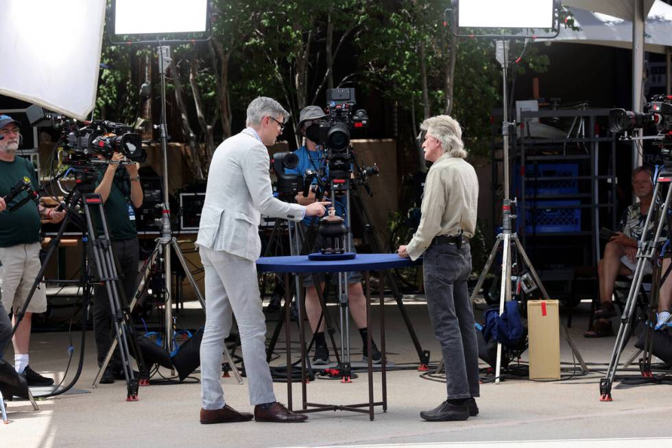 Mark, right, talks to expert Richard Cervantes about his Chinese Archaistic Bronze Ding Vessel ...