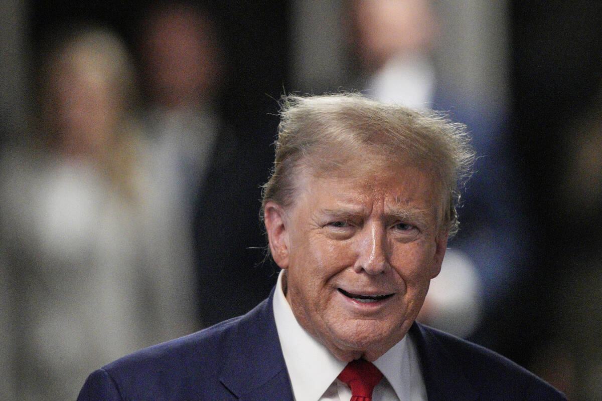 Former President Donald Trump speaks to the media outside the courtroom of his trial at Manhatt ...