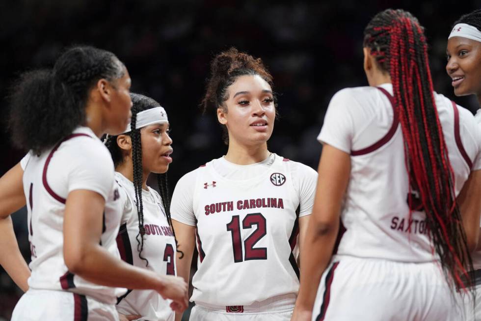 South Carolina guard Brea Beal (12), Destanni Henderson (3), Zia Cooke (1), Victaria Saxton (5) ...