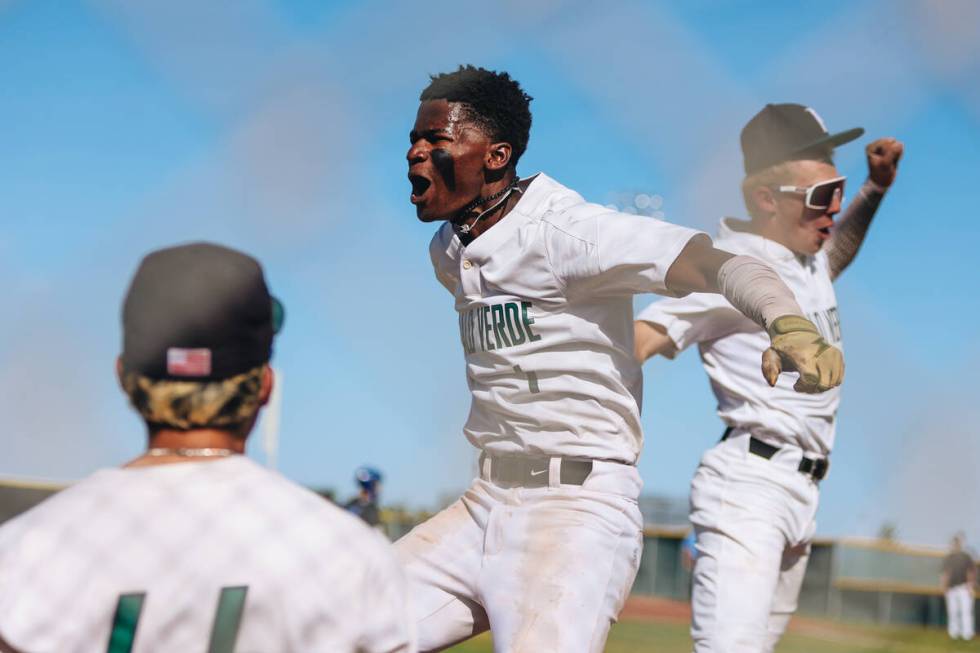 Palo Verde outfielder RL Chandler celebrates a home run with his teammates during a baseball ga ...