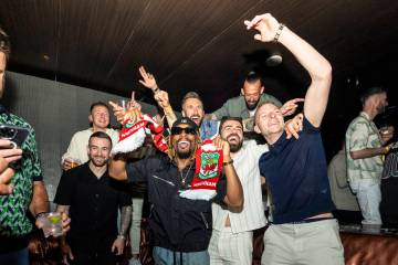 Lil Jon celebrates with members of Wrexham soccer club of Wales at Hakkasan at MGM Grand on Thu ...