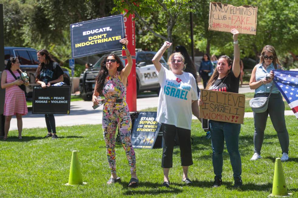 Pro-Israeli counterdemonstrators chant as pro-Palestianian protesters and student groups gather ...