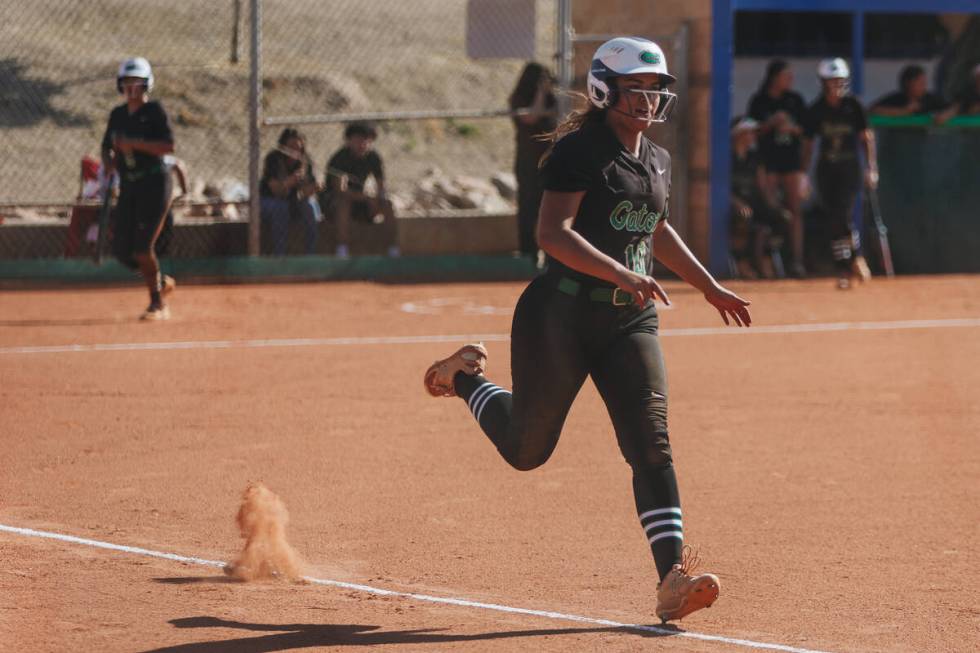 Green Valley’s Amaya Lobato (10) runs to first base during a softball game between Silve ...