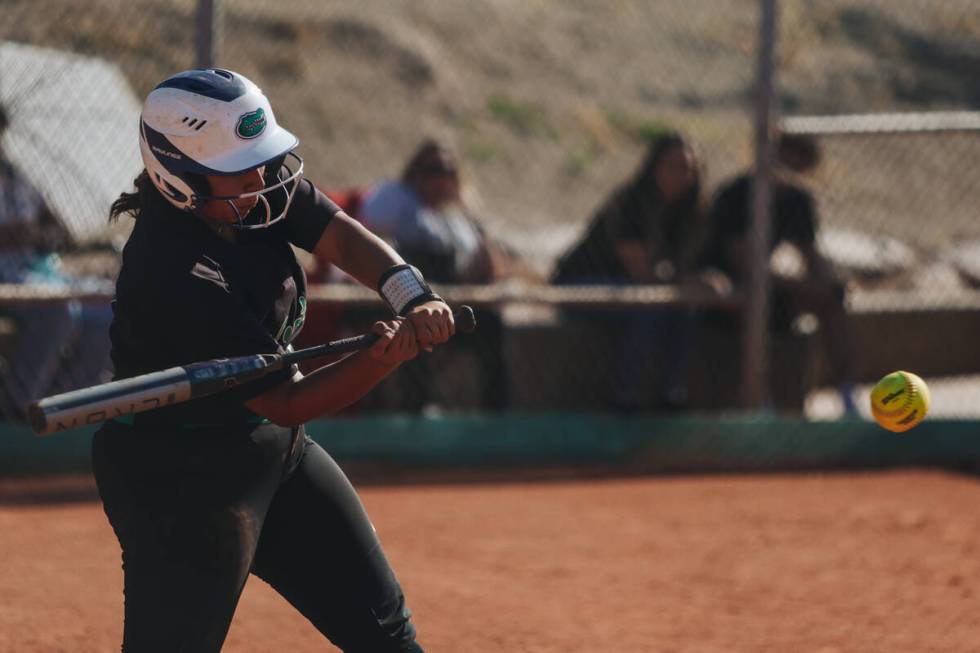 Green Valley pitcher Mia Mor Hernandez (17) swings at the ball during a softball game between S ...